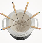 Service à fondue en fonte montagne