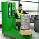 Máquina enfardadora de equipaje con plataforma giratoria