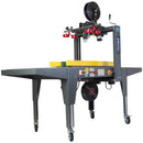 Máquina semiautomática precintadora de cajas con tracción lateral