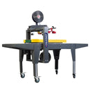 Máquina semiautomática precintadora de cajas con tracción lateral