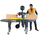 Máquina semiautomática precintadora de cajas con tracción lateral
